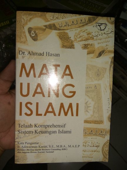 Sampul Mata Uang Islami :  Telaah Komprehensif sistem Keuangan Islam